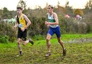 19 November 2023; Brian Fay of Raheny Shamrock AC, Dublin, right, and Peter Lynch of Kilkenny City Harriers AC, Kilkenny, competing in the Mens Senior 9000m during the 123.ie National Senior & Even Age Cross Country Championships at Gowran Demesne in Kilkenny. Photo by Ben McShane/Sportsfile
