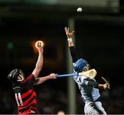 19 November 2023; Mike Casey of Na Piarsaigh reaches for the sliotar ahead of Pauric Mahony of Ballygunner during the AIB Munster GAA Hurling Senior Club Championship Semi-Final match between Na Piarsaigh, Limerick, and Ballygunner, Waterford, at TUS Gaelic Grounds in Limerick. Photo by Brendan Moran/Sportsfile
