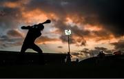 19 November 2023; Paddy Leavey of Ballygunner takes a slideline cut as the sun sets during the AIB Munster GAA Hurling Senior Club Championship Semi-Final match between Na Piarsaigh, Limerick, and Ballygunner, Waterford, at TUS Gaelic Grounds in Limerick. Photo by Brendan Moran/Sportsfile