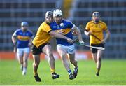 19 November 2023; Paul Flynn of Kiladangan in action against Páraic O'Loughlin of Clonlara during the AIB Munster GAA Hurling Senior Club Championship Semi-Final match between Kiladangan, Tipperary, and Clonlara, Clare, at FBD Semple Stadium in Thurles, Tipperary. Photo by Stephen Marken/Sportsfile