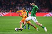 18 November 2023; Xavi Simons of Netherlands in action against Matt Doherty of Republic of Ireland during the UEFA EURO 2024 Championship qualifying group B match between Netherlands and Republic of Ireland at Johan Cruijff ArenA in Amsterdam, Netherlands. Photo by Seb Daly/Sportsfile