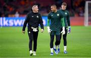 18 November 2023; Republic of Ireland goalkeeper Gavin Bazunu, right, and goalkeeping coach Dean Kiely before the UEFA EURO 2024 Championship qualifying group B match between Netherlands and Republic of Ireland at Johan Cruijff ArenA in Amsterdam, Netherlands. Photo by Seb Daly/Sportsfile