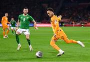 18 November 2023; Quilindschy Hartman of Netherlands in action against Alan Browne of Republic of Ireland during the UEFA EURO 2024 Championship qualifying group B match between Netherlands and Republic of Ireland at Johan Cruijff ArenA in Amsterdam, Netherlands. Photo by Stephen McCarthy/Sportsfile