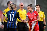 19 November 2023; Shelbourne captain Pearl Slattery and Athlone Town captain Laurie Ryan shake hands with match officials, from left, assistant referee Ricky Crean, referee Marc Lynch and assistant referee Michelle O'Neill before the Sports Direct FAI Women's Cup Final match between Athlone Town and Shelbourne at Tallaght Stadium in Dublin. Photo by Stephen McCarthy/Sportsfile