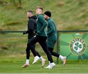 20 November 2023; Evan Ferguson with Alan Browne, left, and Matt Doherty, right, during a Republic of Ireland training session at the FAI National Training Centre in Abbotstown, Dublin. Photo by Stephen McCarthy/Sportsfile