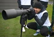 20 November 2023; Callum Robinson takes photographs of team-mates during a Republic of Ireland training session at the FAI National Training Centre in Abbotstown, Dublin. Photo by Stephen McCarthy/Sportsfile