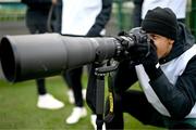 20 November 2023; Callum Robinson takes photographs of team-mates during a Republic of Ireland training session at the FAI National Training Centre in Abbotstown, Dublin. Photo by Stephen McCarthy/Sportsfile