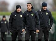 20 November 2023; Adam Idah with Colum O’Neill, athletic therapist, left, and coach John O'Shea, right, during a Republic of Ireland training session at the FAI National Training Centre in Abbotstown, Dublin. Photo by Stephen McCarthy/Sportsfile