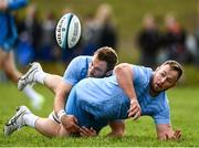 20 November 2023; Ed Byrne is tackled by Jason Jenkins during a squad training session on the Leinster Rugby 12 Counties Tour at Kilkenny College in Kilkenny. Photo by Harry Murphy/Sportsfile