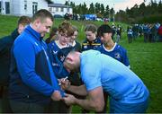 20 November 2023; Jack Conan signs autographs after a squad training session on the Leinster Rugby 12 Counties Tour at Kilkenny College in Kilkenny. Photo by Harry Murphy/Sportsfile