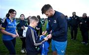 20 November 2023; Ross Byrne signs autographs after a squad training session on the Leinster Rugby 12 Counties Tour at Kilkenny College in Kilkenny. Photo by Harry Murphy/Sportsfile