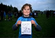 20 November 2023; Hugo McGlyn, aged nine, with autographs for his friend Jack after a squad training session on the Leinster Rugby 12 Counties Tour at Kilkenny College in Kilkenny. Photo by Harry Murphy/Sportsfile