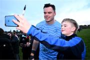 20 November 2023; James Ryan takes a selfie with a supporter after a squad training session on the Leinster Rugby 12 Counties Tour at Kilkenny College in Kilkenny. Photo by Harry Murphy/Sportsfile