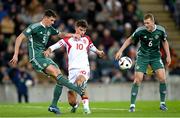 20 November 2023; Eoin Toal of Northern Ireland in action against Matthew O'Riley of Denmark during the UEFA EURO 2024 Qualifying Round Group H match between Northern Ireland and Denmark at the National Stadium at Windsor Park in Belfast. Photo by Ramsey Cardy/Sportsfile