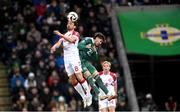 20 November 2023; Thomas Delaney of Denmark in action against Trai Hume of Northern Ireland during the UEFA EURO 2024 Qualifying Round Group H match between Northern Ireland and Denmark at the National Stadium at Windsor Park in Belfast. Photo by Ramsey Cardy/Sportsfile