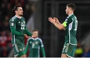 20 November 2023; Paddy McNair, right, and Ciaron Brown of Northern Ireland after the UEFA EURO 2024 Qualifying Round Group H match between Northern Ireland and Denmark at the National Stadium at Windsor Park in Belfast. Photo by Ramsey Cardy/Sportsfile Photo by Ramsey Cardy/Sportsfile