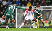 20 November 2023; Mohamed Daramy of Denmark in action against Shea Charles, left, and Dion Charles of Northern Ireland during the UEFA EURO 2024 Qualifying Round Group H match between Northern Ireland and Denmark at the National Stadium at Windsor Park in Belfast. Photo by Ramsey Cardy/Sportsfile