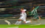 20 November 2023; Jesper Lindstrøm of Denmark in action against Jamal Lewis of Northern Ireland during the UEFA EURO 2024 Qualifying Round Group H match between Northern Ireland and Denmark at the National Stadium at Windsor Park in Belfast. Photo by Ramsey Cardy/Sportsfile