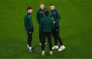 21 November 2023; Republic of Ireland coach Keith Andrews in conversation with Republic of Ireland players, from left, Matt Doherty, James McClean and Shane Duffy before the international friendly match between Republic of Ireland and New Zealand at Aviva Stadium in Dublin. Photo by Ben McShane/Sportsfile