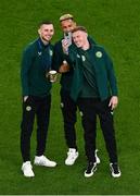 21 November 2023; James McClean of Republic of Ireland, right, takes a selfie with team-mates Alan Browne, left, and Callum Robinson before the international friendly match between Republic of Ireland and New Zealand at Aviva Stadium in Dublin. Photo by Ben McShane/Sportsfile