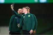 21 November 2023; James McClean of Republic of Ireland takes a selfie with teamamates Alan Browne, left, and Callum Robinson before the international friendly match between Republic of Ireland and New Zealand at the Aviva Stadium in Dublin. Photo by Michael P Ryan/Sportsfile