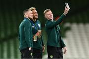 21 November 2023; Republic of Ireland players, from left, Alan Browne, Callum Robinson and James McClean before the international friendly match between Republic of Ireland and New Zealand at Aviva Stadium in Dublin. Photo by Piaras Ó Mídheach/Sportsfile