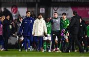 21 November 2023; A member of the Italy coaching staff is escorted from the pitch after the UEFA European Under-21 Championship Qualifier match between Republic of Ireland and Italy at Turners Cross in Cork. Photo by Eóin Noonan/Sportsfile