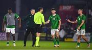 21 November 2023; Sinclair Armstrong of Republic of Ireland is held back by Republic of Ireland manager Jim Crawford after the UEFA European Under-21 Championship Qualifier match between Republic of Ireland and Italy at Turners Cross in Cork. Photo by Eóin Noonan/Sportsfile