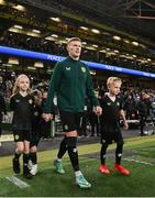 21 November 2023; James McClean of Republic of Ireland walks out with his children, from left, Allie Mae, Willow Ivy and Junior James before the international friendly match between Republic of Ireland and New Zealand at Aviva Stadium in Dublin. Photo by Stephen McCarthy/Sportsfile