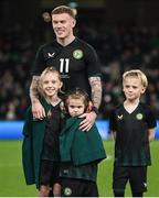 21 November 2023; James McClean of Republic of Ireland  with his children, from left, Allie Mae, Willow Ivy and Junior James before the international friendly match between Republic of Ireland and New Zealand at Aviva Stadium in Dublin. Photo by Stephen McCarthy/Sportsfile