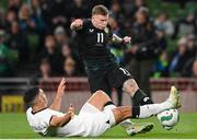 21 November 2023; James McClean of Republic of Ireland in action against Michael Boxall of New Zealand during the international friendly match between Republic of Ireland and New Zealand at Aviva Stadium in Dublin. Photo by Seb Daly/Sportsfile