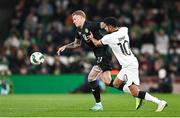 21 November 2023; James McClean of Republic of Ireland in action against Sarpreet Singh of New Zealand during the international friendly match between Republic of Ireland and New Zealand at Aviva Stadium in Dublin. Photo by Stephen McCarthy/Sportsfile