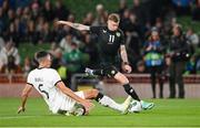 21 November 2023; James McClean of Republic of Ireland in action against Michael Boxall of New Zealand during the international friendly match between Republic of Ireland and New Zealand at Aviva Stadium in Dublin. Photo by Seb Daly/Sportsfile