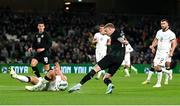 21 November 2023; James McClean of Republic of Ireland has a shot blocked byMichael Boxall of New Zealand during the international friendly match between Republic of Ireland and New Zealand at Aviva Stadium in Dublin. Photo by Stephen McCarthy/Sportsfile