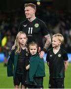 21 November 2023; James McClean of Republic of Ireland  with his children, from left, Allie Mae, Willow Ivy and Junior James before the international friendly match between Republic of Ireland and New Zealand at Aviva Stadium in Dublin. Photo by Stephen McCarthy/Sportsfile