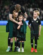 21 November 2023; James McClean of Republic of Ireland with his children, from left, Allie Mae, Willow Ivy and Junior James before the international friendly match between Republic of Ireland and New Zealand at Aviva Stadium in Dublin. Photo by Stephen McCarthy/Sportsfile