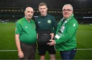 21 November 2023; The Derry Republic of Ireland Supporters Club make a presentation to James McClean of Republic of Ireland before the international friendly match between Republic of Ireland and New Zealand at Aviva Stadium in Dublin. Photo by Stephen McCarthy/Sportsfile