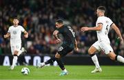 21 November 2023; Adam Idah of Republic of Ireland shoots to score his side's first goal during the international friendly match between Republic of Ireland and New Zealand at Aviva Stadium in Dublin. Photo by Stephen McCarthy/Sportsfile