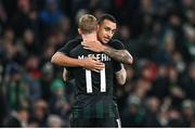 21 November 2023; Adam Idah of Republic of Ireland is congratulated by teammate James McClean, 11, after scoring their side's first goal during the international friendly match between Republic of Ireland and New Zealand at Aviva Stadium in Dublin. Photo by Stephen McCarthy/Sportsfile
