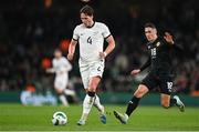 21 November 2023; Nando Pijnaker of New Zealand in action against Jamie McGrath of Republic of Ireland during the international friendly match between Republic of Ireland and New Zealand at Aviva Stadium in Dublin. Photo by Stephen McCarthy/Sportsfile