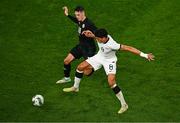 21 November 2023; Jamie McGrath of Republic of Ireland in action against Marko Stamenic of New Zealand during the international friendly match between Republic of Ireland and New Zealand at Aviva Stadium in Dublin. Photo by Ben McShane/Sportsfile