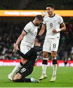 21 November 2023; Tim Payne of New Zealand and Jamie McGrath of Republic of Ireland during the international friendly match between Republic of Ireland and New Zealand at Aviva Stadium in Dublin. Photo by Stephen McCarthy/Sportsfile