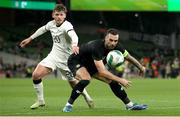 21 November 2023; Shane Duffy of Republic of Ireland in action against Callum McCowatt of New Zealand during the international friendly match between Republic of Ireland and New Zealand at the Aviva Stadium in Dublin. Photo by Michael P Ryan/Sportsfile