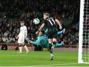 21 November 2023; Republic of Ireland goalkeeper Mark Travers makes a save during the international friendly match between Republic of Ireland and New Zealand at the Aviva Stadium in Dublin. Photo by Michael P Ryan/Sportsfile
