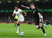 21 November 2023; James McClean of Republic of Ireland in action against Sarpreet Singh of New Zealand during the international friendly match between Republic of Ireland and New Zealand at the Aviva Stadium in Dublin. Photo by Michael P Ryan/Sportsfile