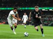 21 November 2023; James McClean of Republic of Ireland in action against Sarpreet Singh of New Zealand during the international friendly match between Republic of Ireland and New Zealand at the Aviva Stadium in Dublin. Photo by Michael P Ryan/Sportsfile