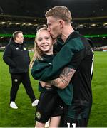 21 November 2023; James McClean of Republic of Ireland with his daughter Allie Mae after the international friendly match between Republic of Ireland and New Zealand at Aviva Stadium in Dublin. Photo by Stephen McCarthy/Sportsfile