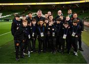 21 November 2023; Republic of Ireland manager Stephen Kenny meets ballkids from St. Kevin's Boys before the international friendly match between Republic of Ireland and New Zealand at Aviva Stadium in Dublin. Photo by Stephen McCarthy/Sportsfile