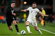 21 November 2023; Tim Payne of New Zealand in action against Jamie McGrath of Republic of Ireland during the international friendly match between Republic of Ireland and New Zealand at the Aviva Stadium in Dublin. Photo by Seb Daly/Sportsfile