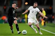 21 November 2023; Tim Payne of New Zealand in action against Jamie McGrath of Republic of Ireland during the international friendly match between Republic of Ireland and New Zealand at the Aviva Stadium in Dublin. Photo by Seb Daly/Sportsfile